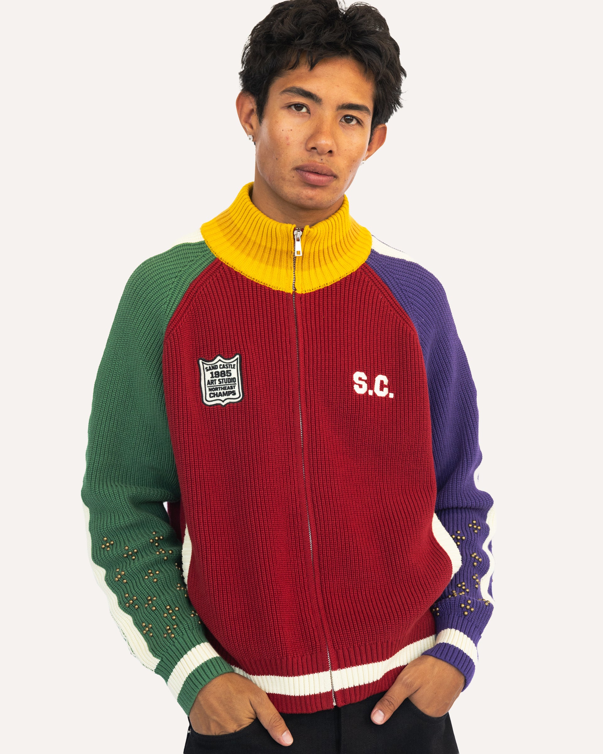 Coach Knit Sweater in Recess, zipped front view on model — Sand Castle Atelier