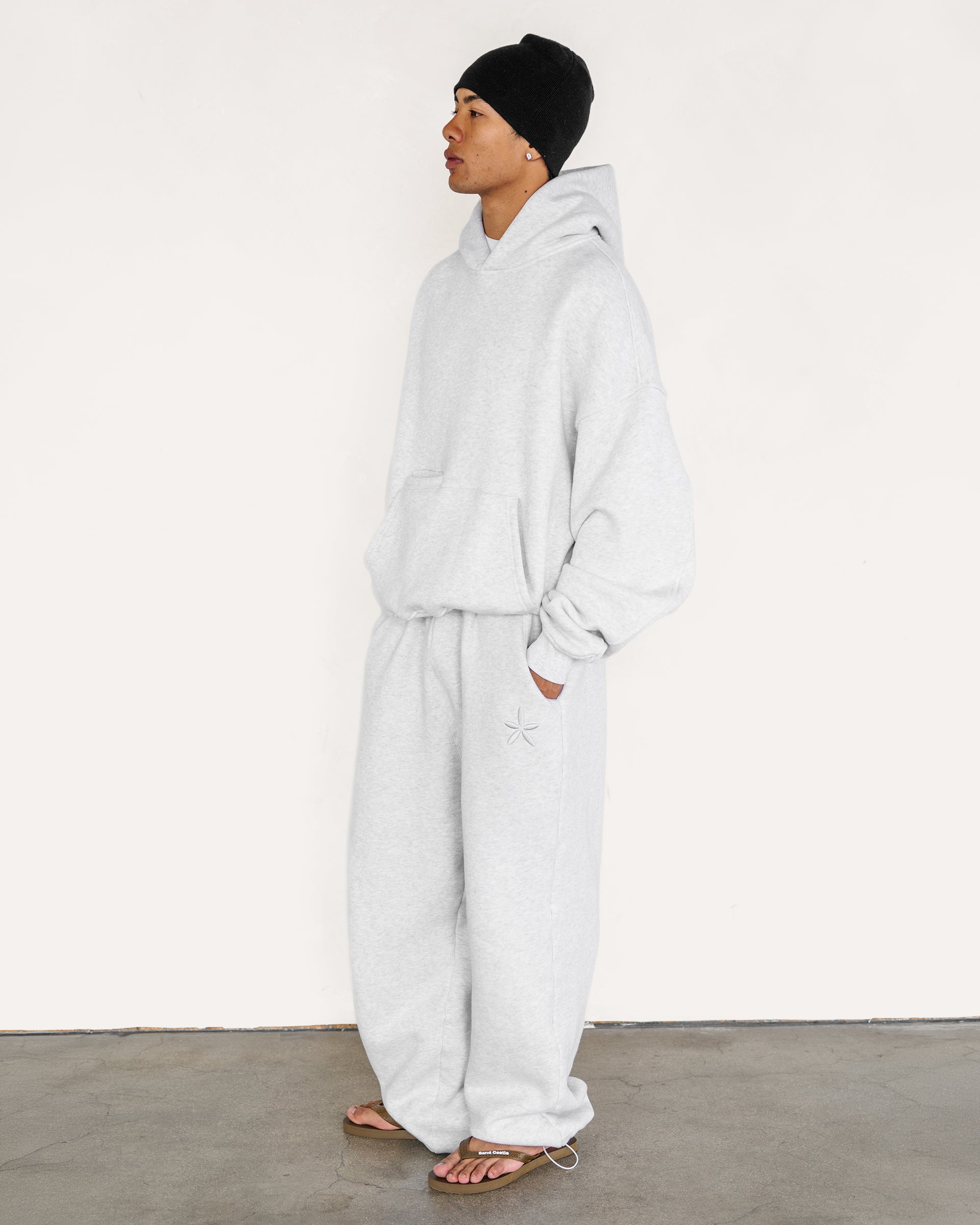 Model wearing heather grey sweatpants, full length view — Sand Castle Atelier